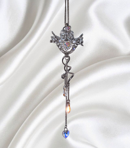 Closet children, necklace, choker, jewelry, made in Singapore, Singapore, handmade, one of a kind, stainless steel, anodized aluminum, titanium, Swarovski, crystal, gem, hoop, pink, purple, aurora lights, Los Angeles, shop Kathleen, Kathleen