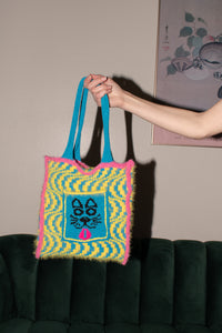Kathleen, kathleen los angeles, independent fashion, independent artist, independent designer, los angeles fashion, small business, handmade, handknit, knit machine, puppy tote, dog tote, fuzzy tote, crochet, embroidery, psychedelic print, square tote, stretch tote, animal tote, jessica stahl, stahl knit, one of a kind, one of a kind knit tote, yellow tote, pink tote, blue tote, furry tote