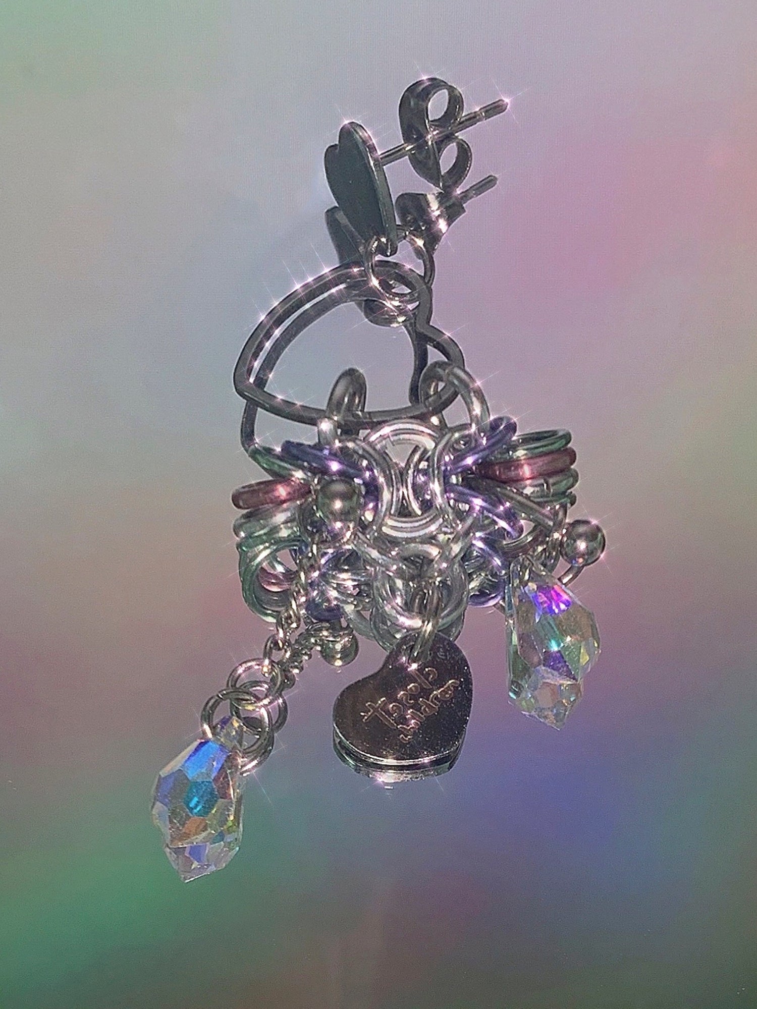 Closet children, earring, earrings, jewelry, made in Singapore, Singapore, handmade, one of a kind, stainless steel, anodized aluminum, titanium, Swarovski, crystal, gem, hoop, pink, purple, aurora lights, Los Angeles, shop Kathleen, Kathleen