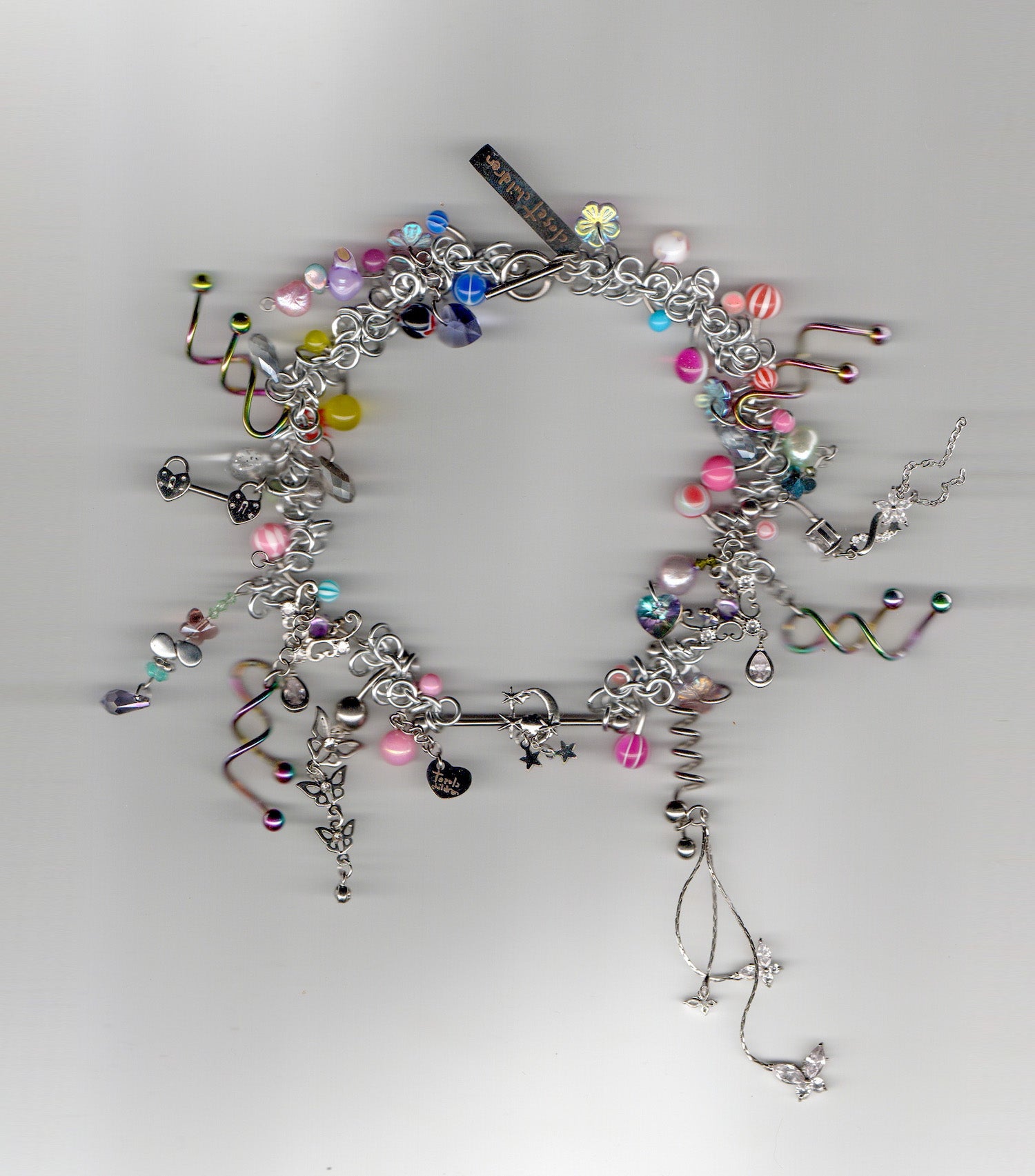 Closet children, necklace, choker, jewelry, made in Singapore, Singapore, handmade, one of a kind, stainless steel, anodized aluminum, titanium, Swarovski, crystal, gem, hoop, pink, purple, aurora lights, Los Angeles, shop Kathleen, Kathleen