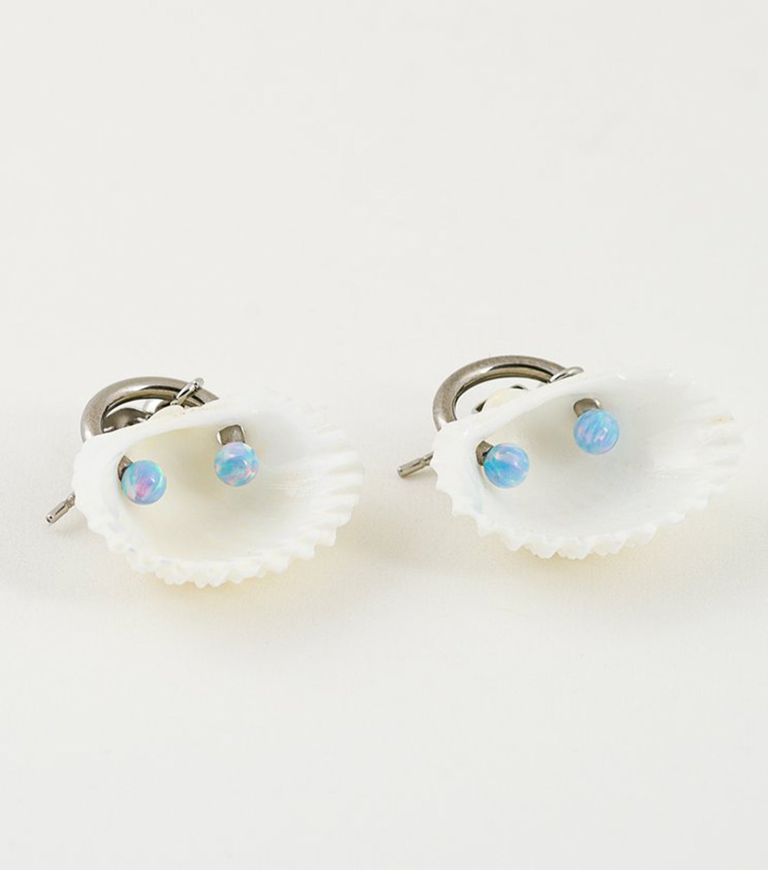 soft blonde, ark, ark earrings, pierced, hoops, shell, opal, barbell, shell earrings, baltimore, handmade, maryland, los angeles, kathleen