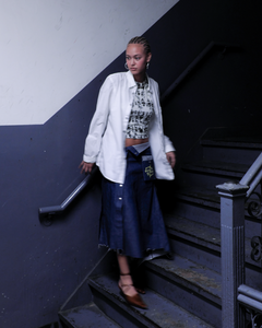 delicate porcelain, kathleen, shop kathleen, rave skirt, jnco skirt, 90s skirt, denim skirt, shredded skirt, trumpet skirt, raw denim, independent designer, small batch fashion, nyc designer
